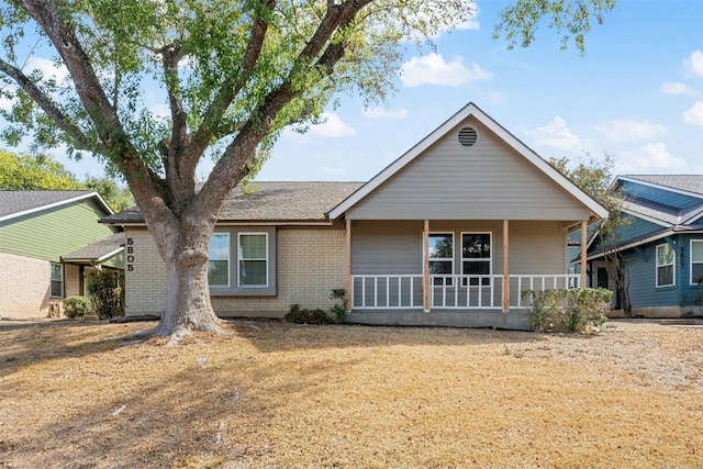 ranch-style house featuring a porch