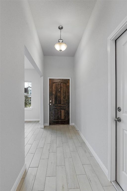 foyer entrance featuring light wood-type flooring