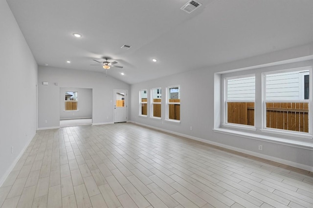 spare room with ceiling fan and lofted ceiling