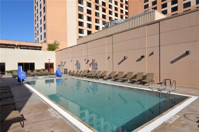 view of pool with a patio area