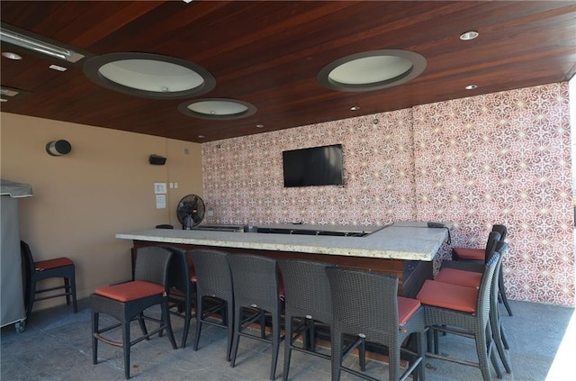 bar featuring wood ceiling