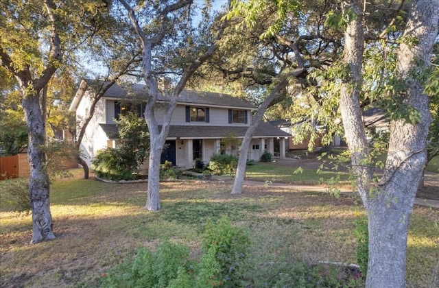 traditional home with a front yard