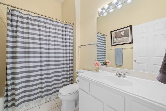 bathroom with vanity, a shower with curtain, toilet, and tile patterned flooring