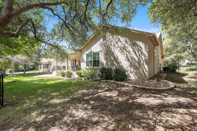 exterior space with covered porch and a lawn