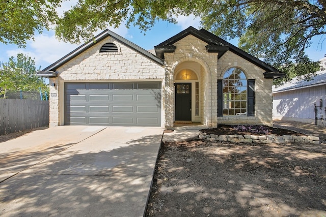 view of front of home with a garage