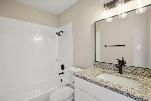 full bath with  shower combination, vanity, and toilet