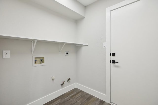 laundry area with gas dryer hookup, laundry area, dark wood-type flooring, washer hookup, and baseboards