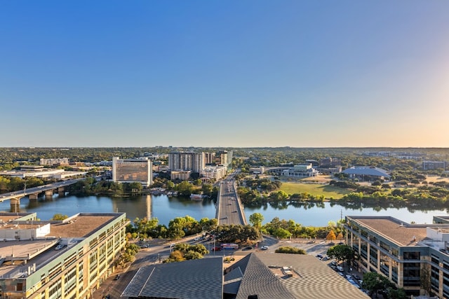 aerial view at dusk with a water view