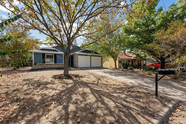 single story home featuring a garage