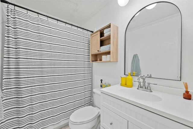 bathroom featuring vanity, a textured ceiling, walk in shower, and toilet