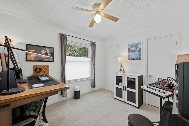 carpeted office with a textured ceiling and ceiling fan