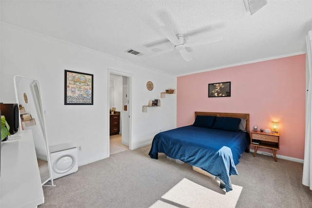 carpeted bedroom with ornamental molding, a textured ceiling, and ceiling fan