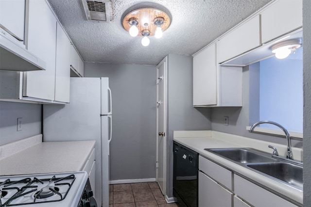 kitchen featuring black dishwasher, sink, white range with gas cooktop, white cabinets, and tile patterned flooring