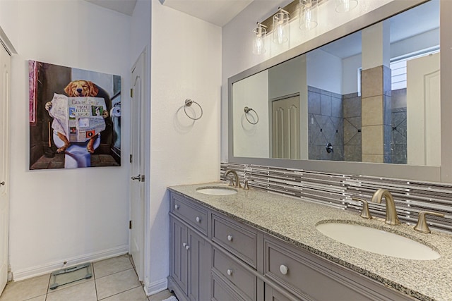 bathroom featuring vanity, walk in shower, and tile patterned flooring