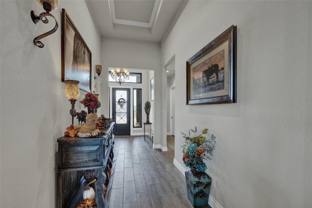 505 John Price St, Blanco, TX 78606 - entrance foyer featuring wood finish floors and a chandelier