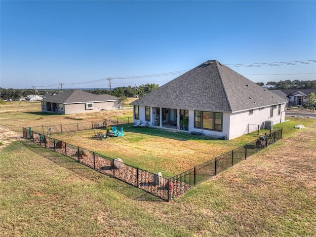505 John Price St, Blanco, TX 78606 - back of house featuring a shingled roof