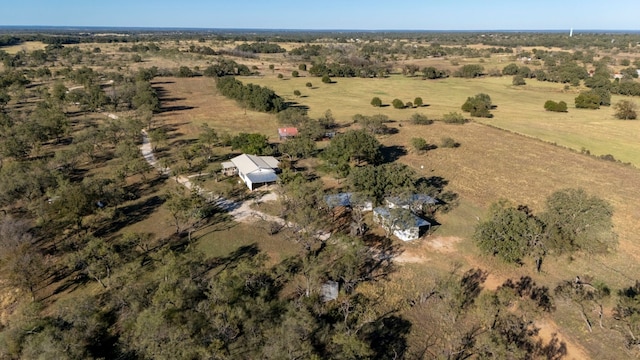 birds eye view of property featuring a rural view