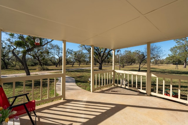 view of patio featuring a porch