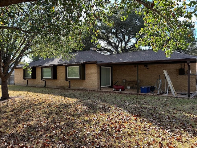 rear view of house with a patio