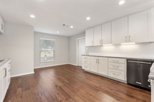 kitchen featuring visible vents, dark wood finished floors, dishwasher, white cabinetry, and backsplash