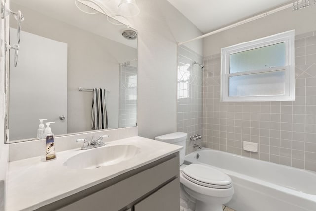 6803 Fence Line Dr, Austin, TX 78749 - bathroom with washtub / shower combination, toilet, and vanity