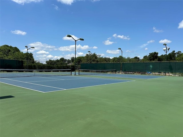 6803 Fence Line Dr, Austin, TX 78749 - view of tennis court with community basketball court