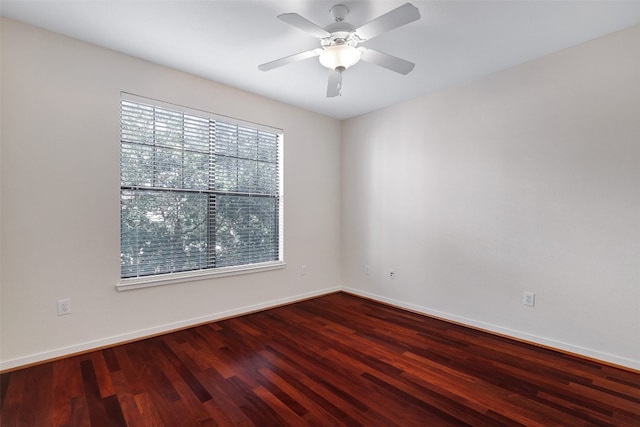 empty room featuring ceiling fan and wood-type flooring