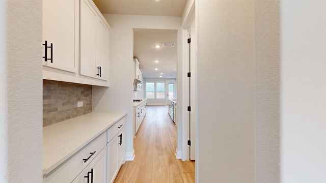 hall featuring light hardwood / wood-style floors