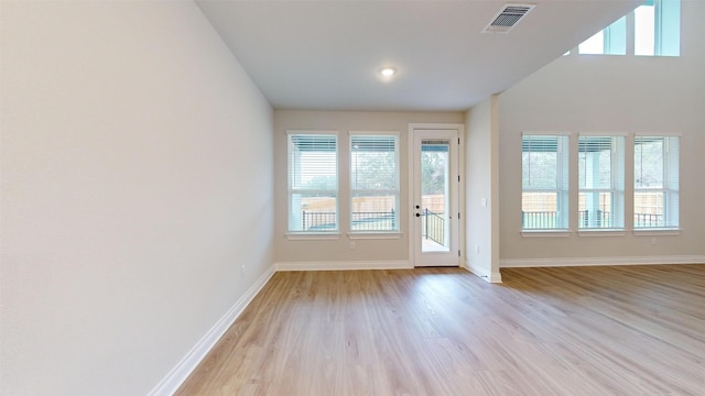 doorway to outside with light hardwood / wood-style flooring