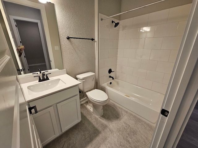 1709 Garret Oaks Ln, Georgetown, TX 78633 - full bathroom featuring a textured wall, vanity, and shower / bathtub combination