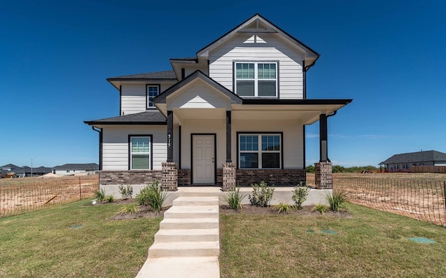 view of front facade with a front yard