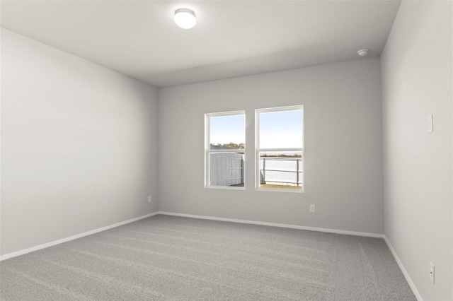 196 Lavender Ln, Elgin, TX 78621 - empty room with baseboards and carpet
