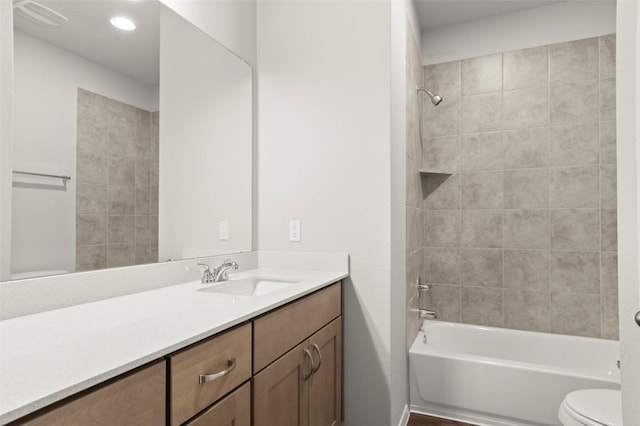 196 Lavender Ln, Elgin, TX 78621 - full bath featuring toilet, vanity, washtub / shower combination, and visible vents