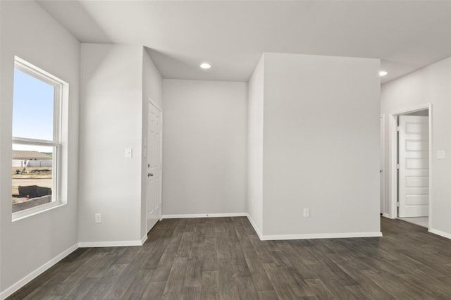 196 Lavender Ln, Elgin, TX 78621 - empty room with baseboards, recessed lighting, and dark wood finished floors