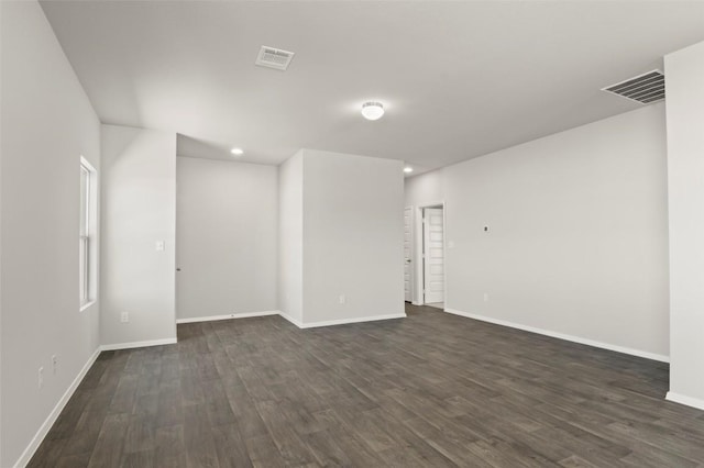 196 Lavender Ln, Elgin, TX 78621 - spare room with baseboards, visible vents, recessed lighting, and dark wood finished floors