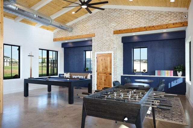196 Lavender Ln, Elgin, TX 78621 - recreation room with pool table, high vaulted ceiling, finished concrete floors, ceiling fan, and recessed lighting