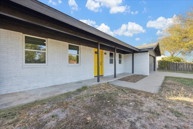 ranch-style home with a patio area