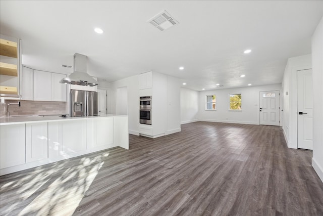 interior space featuring hardwood / wood-style flooring and sink