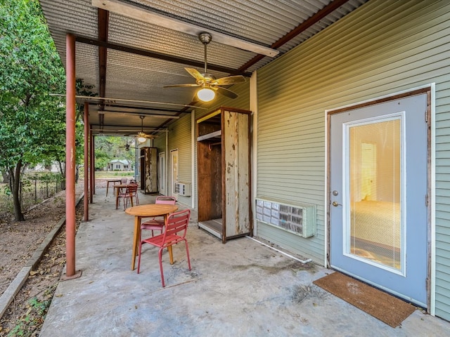 view of patio / terrace featuring ceiling fan