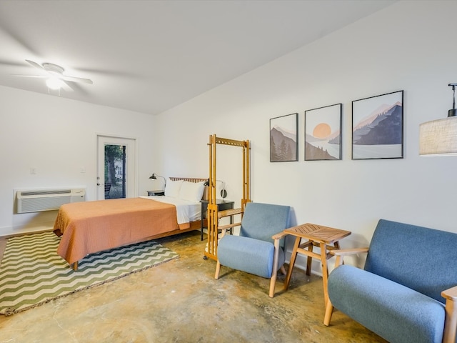 bedroom with ceiling fan, an AC wall unit, and concrete flooring