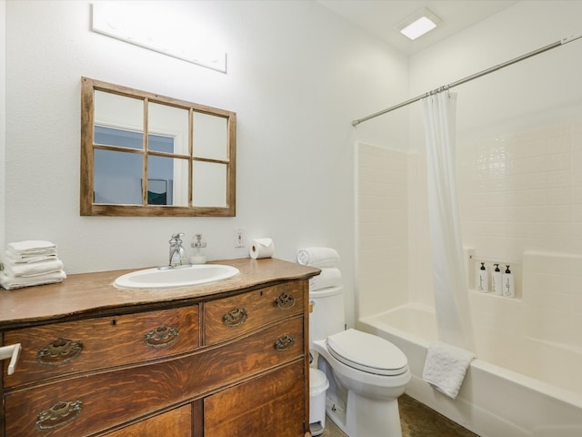 full bathroom featuring toilet, vanity, and shower / tub combo