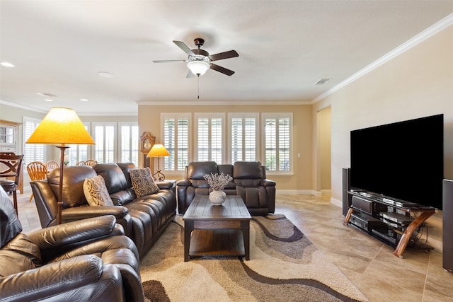 living room with ornamental molding, light tile patterned floors, and ceiling fan