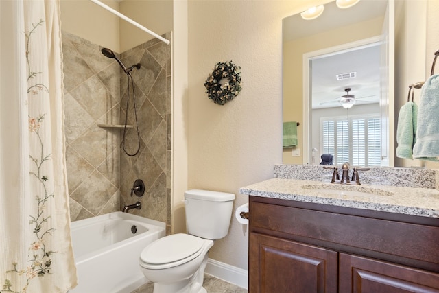 full bathroom featuring vanity, toilet, shower / tub combo with curtain, and ceiling fan