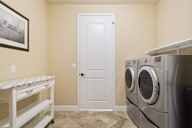 washroom featuring independent washer and dryer