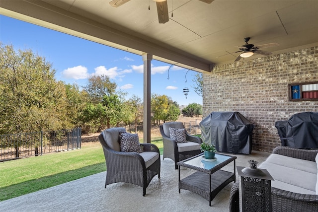 view of patio / terrace featuring area for grilling, outdoor lounge area, and ceiling fan