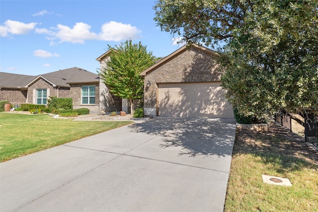 view of front facade with a front yard and a garage