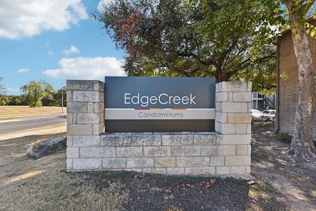 view of community sign