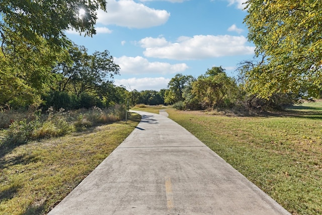 surrounding community featuring a lawn