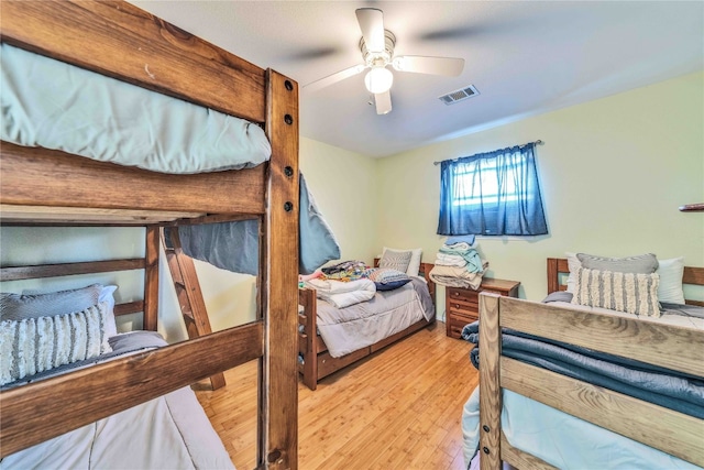 bedroom featuring light wood-type flooring and ceiling fan