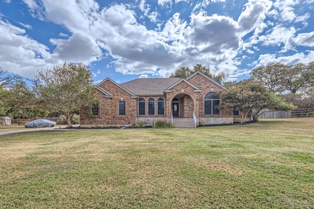 view of front of house with a front yard